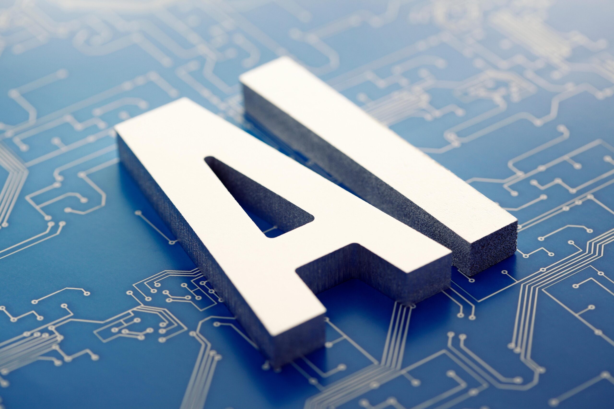 Cover image for the content on Adopting Generative AI, featuring a sign with the acronym AI for artificial intelligence.